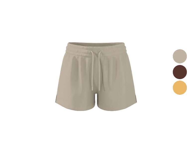 Shorts de sport beiges avec cordon de serrage, disponibles en trois couleurs.