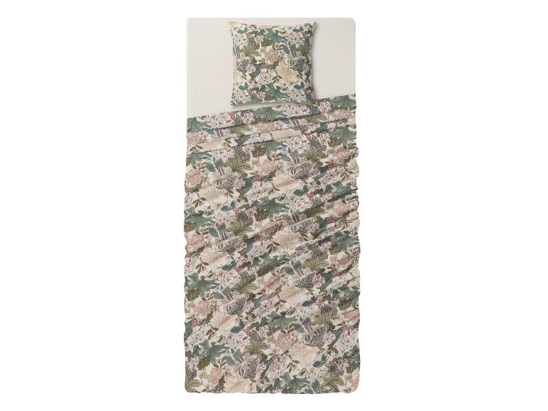 Draps et taie d'oreiller à motifs floraux.