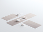 Illustration de quatre robots aspirateurs nettoyant des tapis dans différentes directions.