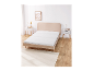 Matelas en mousse confort LIVARNO HOME sur un lit double dans une chambre lumineuse.