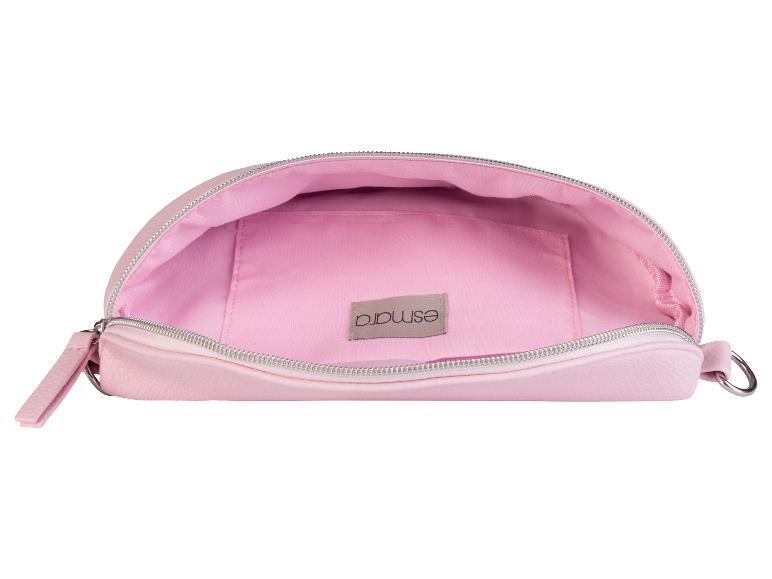 Un sac Esmée rose avec la fermeture éclair ouverte.