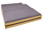 Un lit en bois avec trois matelas.