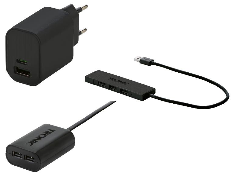 Un chargeur USB noir, un concentrateur USB à quatre ports et un câble d'extension de TRONIC.
