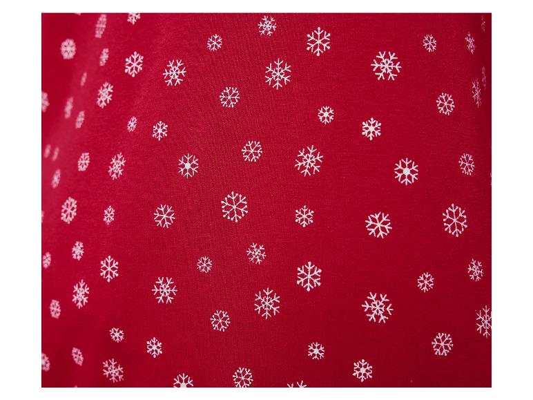 Tissu rouge avec des flocons de neige blancs