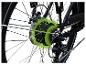 Roue arrière de vélo électrique avec moteur éclairé en vert et engrenages Shimano.