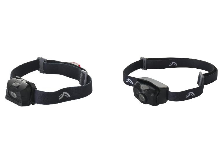 Deux lampes frontales noires avec des sangles réglables.