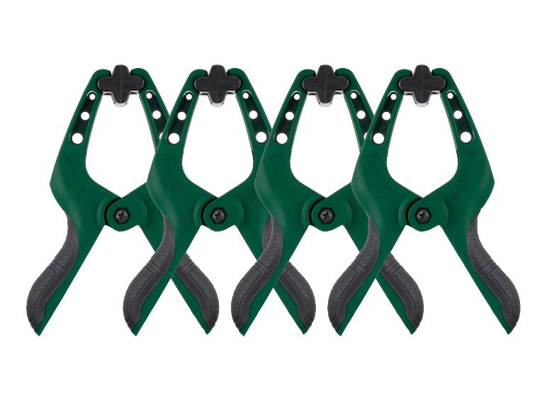 Quatre serre-joints à ressort verts et noirs de marque Parkside.