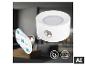 Lampe LED ronde blanche avec support magnétique et ruban adhésif 3M.