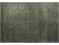 Tapis gris avec un motif abstrait et ondulé.
