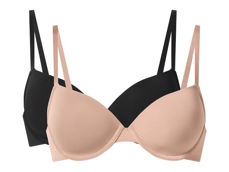 Deux soutiens-gorge push-up, un noir et un couleur chair, sur fond blanc.