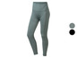 Un legging vert sans couture pour femme.