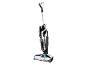 Aspirateur balai noir et blanc avec des touches de bleu.
