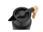 Carafe isotherme noire avec poignée en bambou.