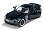 Une voiture miniature Mercedes-Benz AMG GT noire.
