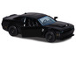 Une voiture jouet Dodge Challenger noire avec la porte ouverte.