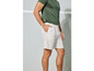 Short de sport blanc et t-shirt vert pour homme.