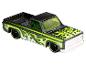 Un pick-up Hot Wheels noir avec des flammes vertes