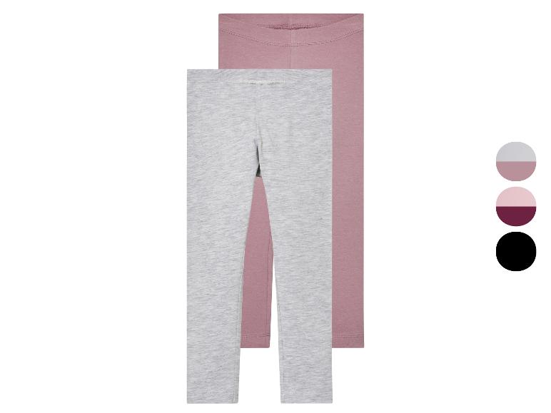 Deux paires de leggings gris et rose.