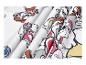 Tissu blanc avec imprimé de chiens de dessin animé aux couleurs vives, plié.