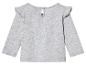 Un t-shirt à manches longues gris avec des volants pour bébés