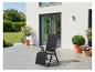 Chaise de jardin noire pliante sur une terrasse ensoleillée avec des plantes en pot