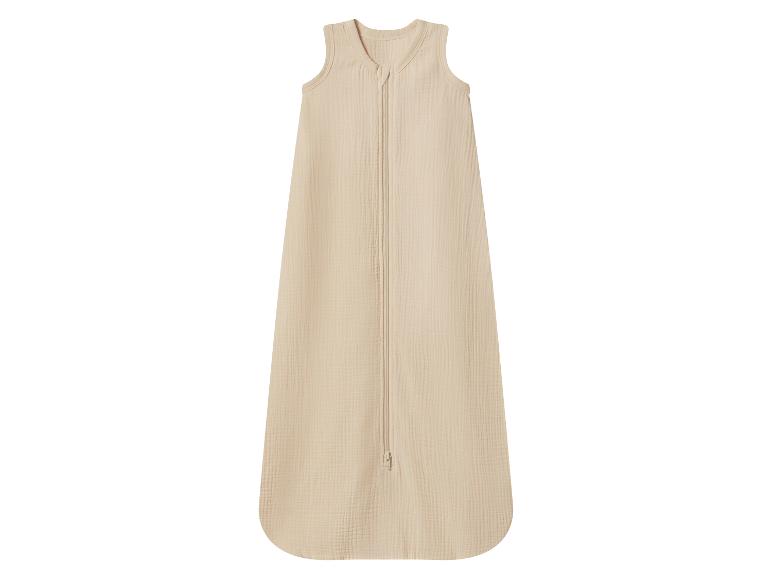 Gigoteuse bébé beige avec fermeture éclair frontale.