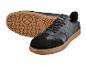 Baskets noires pour hommes avec semelle en gomme et détails en daim.