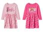 Deux robes roses à manches longues pour filles, une avec l'inscription Barbie et l'autre avec le thème Pat' Patrouille.