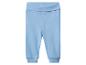 Pantalon de bébé bleu clair avec taille et poignets côtelés.