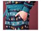Un détail de pantalon de pyjama à motifs de Noël