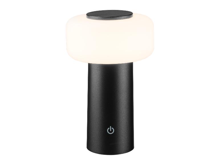 Lampe de table portable noire avec un abat-jour blanc lumineux et un bouton d'alimentation