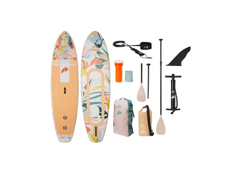 Deux planches de paddle avec motifs floraux, pagaies, pompe, aileron, laisse et sacs.