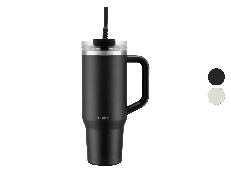 Mug de voyage Bodum noir avec anse et paille, avec des échantillons de couleur noir et gris clair.