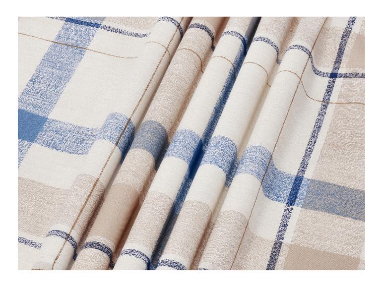 Tissu à carreaux beige et bleu avec des rayures texturées.