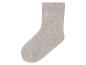 Une chaussette beige à côtes.