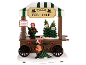 Stand de vente de sapins de Noël avec figurines et prix pour différentes tailles.