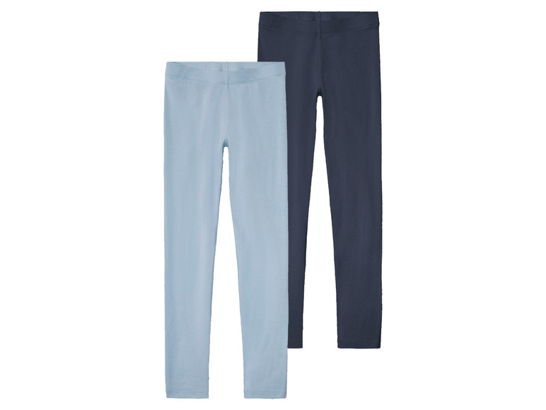 Deux leggings en bleu clair et bleu foncé.