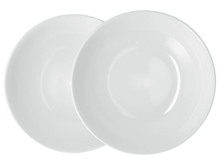 Deux assiettes blanches superposées.