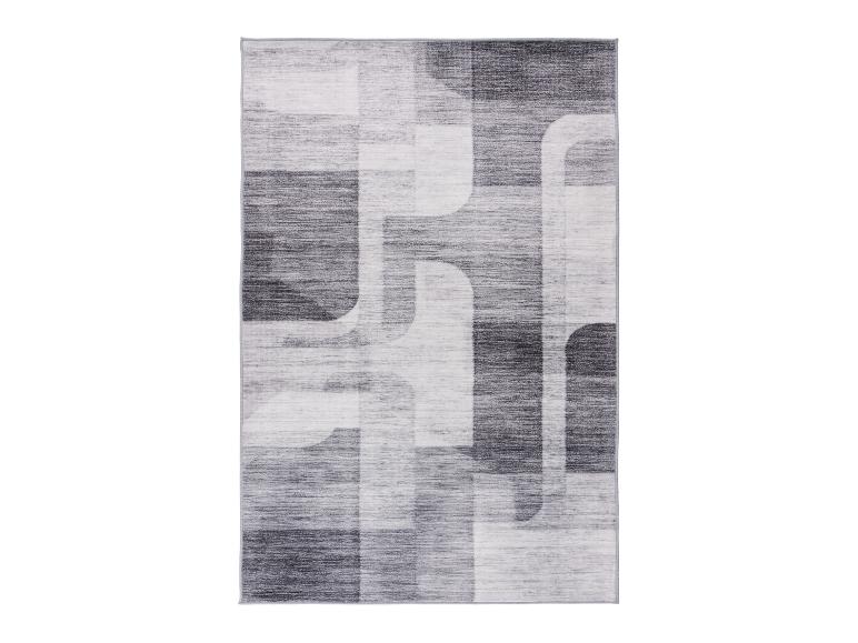 Tapis moderne gris et blanc avec motif géométrique abstrait.