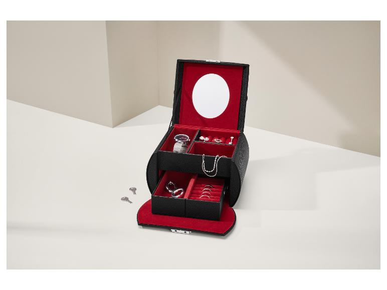 Boîte à bijoux noire et rouge ouverte avec montre, bagues et collier.