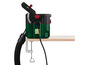 Une fraiseuse Festool DOMINO DF 500 verte avec aspirateur.