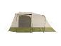 Grande tente de camping beige et verte avec entrée ouverte.