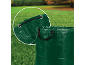 Sac vert pour déchets de jardin avec cordon de serrage et poignées, montré à l'extérieur sur l'herbe.