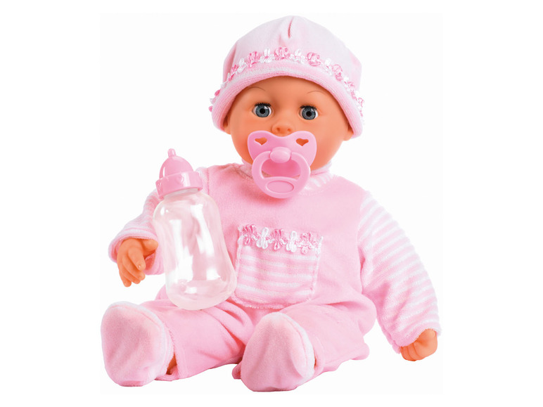 Une poupée bébé rose avec une sucette et un biberon.
