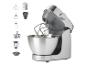 Robot pâtissier gris et argenté avec bol en acier inoxydable et divers accessoires.