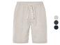 Shorts en lin beige avec cordon de serrage; aussi disponibles en vert foncé et noir.