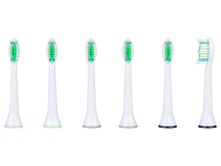Six têtes de brosse à dents blanches interchangeables avec des poils verts et bleus