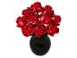 Un bouquet de roses rouges en briques dans un vase noir.