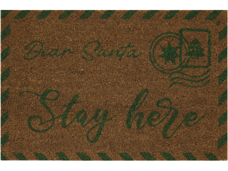 Paillasson avec l'inscription « Dear Santa, Stay here » et motifs de Noël.