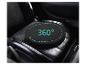 Coussin de siège pivotant noir à 360° sur un siège de voiture.